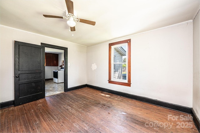 3042 N Oxford St, Claremont, NC 28610 - spare room with dark wood finished floors, a ceiling fan, baseboards, and crown molding