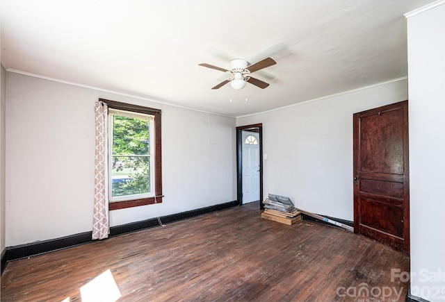 3042 N Oxford St, Claremont, NC 28610 - spare room with wood finished floors, ceiling fan, crown molding, and baseboards