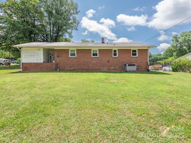 876 Stowe Ln, Gastonia, NC 28056 - rear view of property with crawl space, a yard, cooling unit, and brick siding