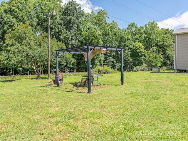 876 Stowe Ln, Gastonia, NC 28056 - view of green lawn featuring a pergola