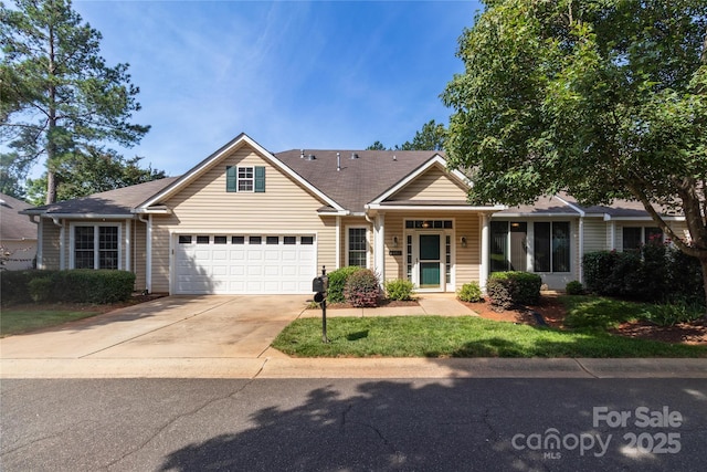 4467 Antelope Ln, Charlotte, NC 28269 - view of front facade featuring concrete driveway and an attached garage