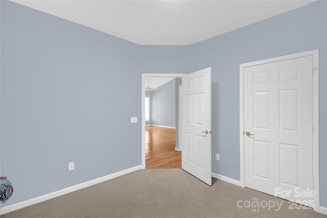 4467 Antelope Ln, Charlotte, NC 28269 - unfurnished bedroom with carpet and baseboards