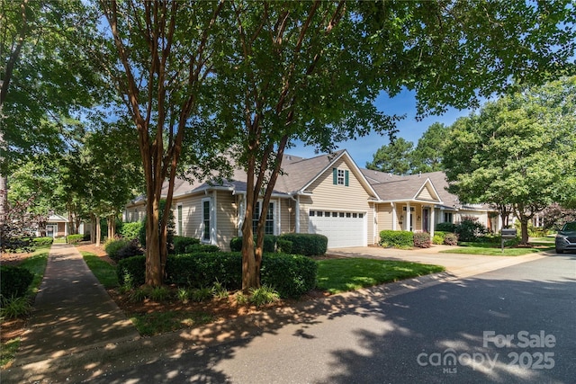 4467 Antelope Ln, Charlotte, NC 28269 - view of front of home featuring a garage and concrete driveway