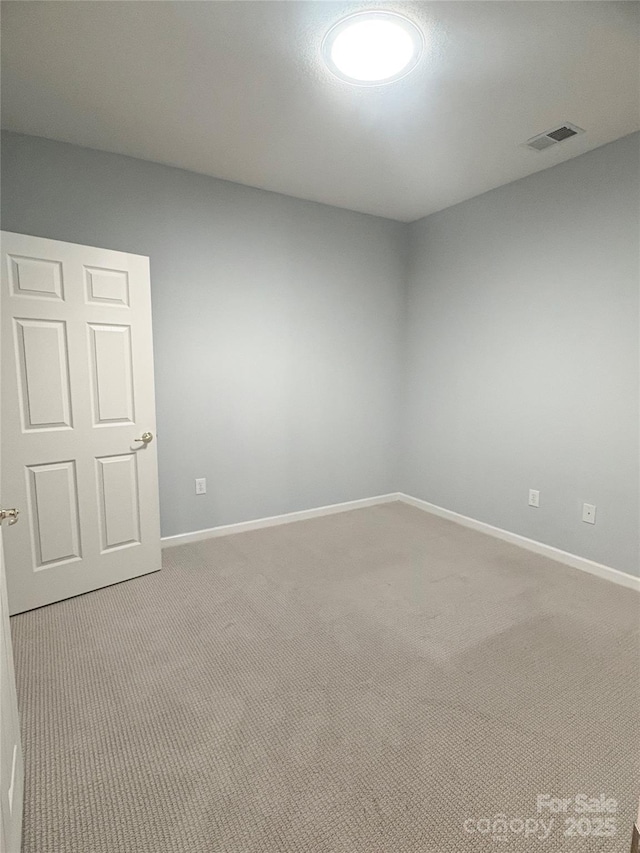 4467 Antelope Ln, Charlotte, NC 28269 - carpeted spare room with baseboards