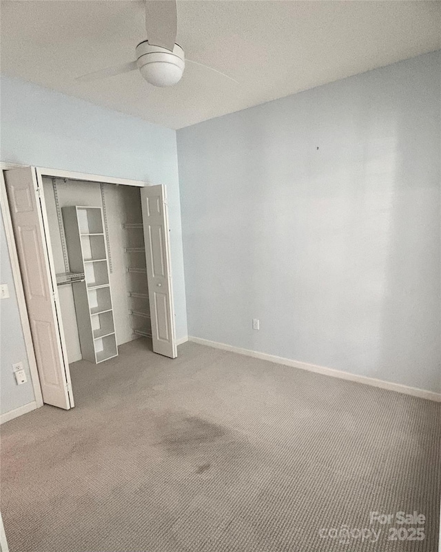 4467 Antelope Ln, Charlotte, NC 28269 - unfurnished bedroom featuring carpet floors, a closet, and ceiling fan