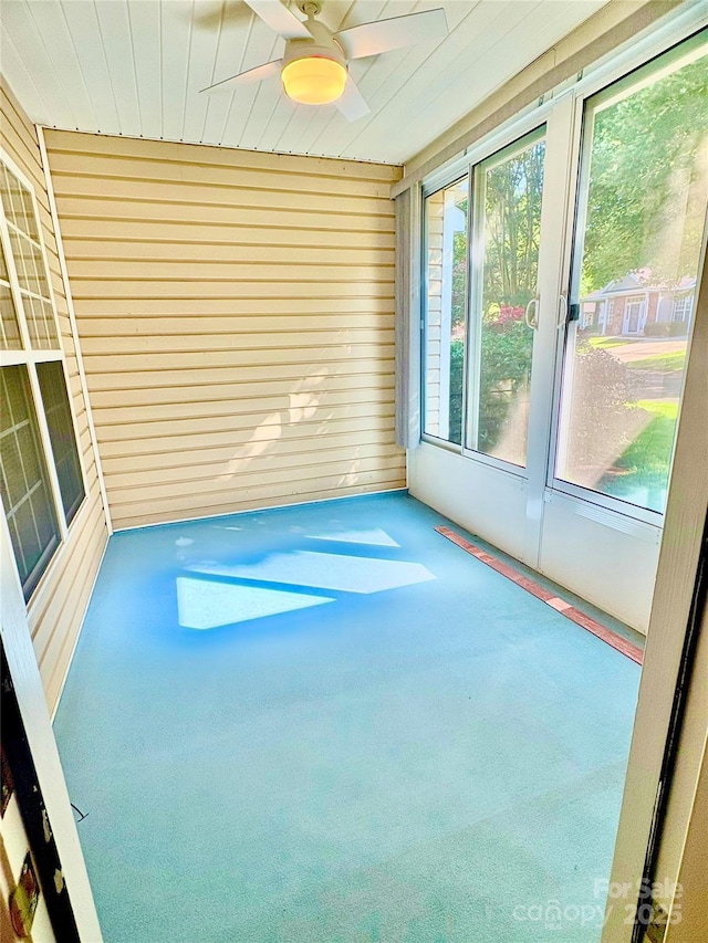4467 Antelope Ln, Charlotte, NC 28269 - unfurnished sunroom featuring ceiling fan