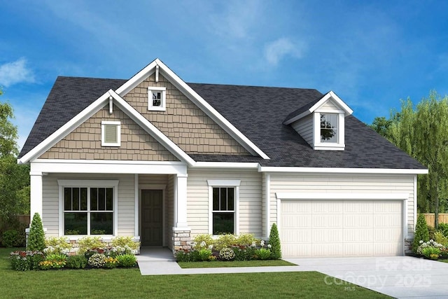 craftsman-style house featuring driveway, a garage, a front yard, and a shingled roof
