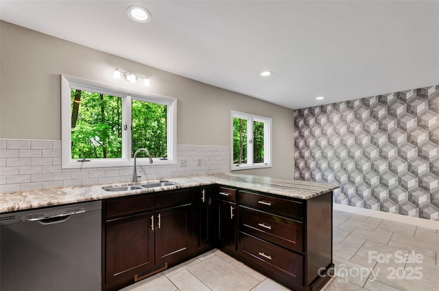 82 Sunburst Dr, Waynesville, NC 28786 - kitchen with dishwasher, a sink, light stone counters, recessed lighting, and dark brown cabinetry