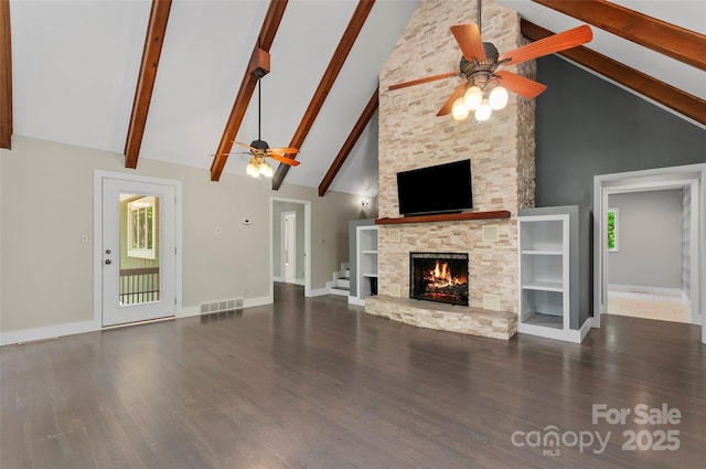 82 Sunburst Dr, Waynesville, NC 28786 - unfurnished living room featuring a ceiling fan, high vaulted ceiling, wood finished floors, baseboards, and a fireplace
