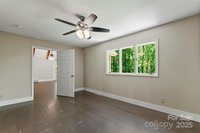 82 Sunburst Dr, Waynesville, NC 28786 - spare room with ceiling fan, baseboards, a smoke detector, and dark wood finished floors