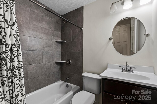 82 Sunburst Dr, Waynesville, NC 28786 - full bathroom featuring a textured ceiling, shower / bathtub combination with curtain, vanity, and toilet