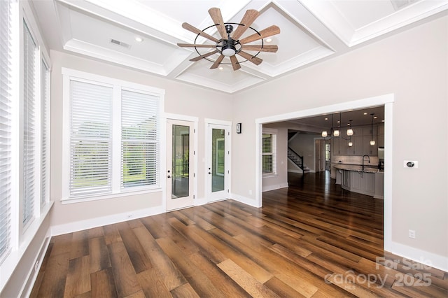 720 Cavesson Way, Monroe, NC 28110 - empty room with healthy amount of natural light, wood finished floors, coffered ceiling, stairs, and a ceiling fan