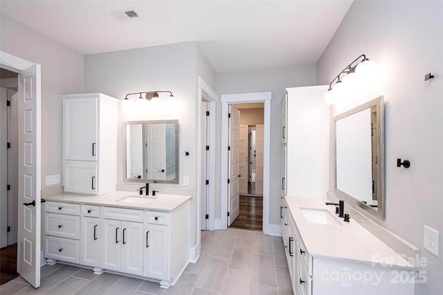720 Cavesson Way, Monroe, NC 28110 - bathroom with two vanities and tile patterned flooring