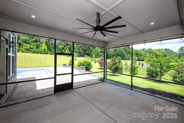 720 Cavesson Way, Monroe, NC 28110 - unfurnished sunroom with a ceiling fan, healthy amount of natural light, view of wooded area, and coffered ceiling