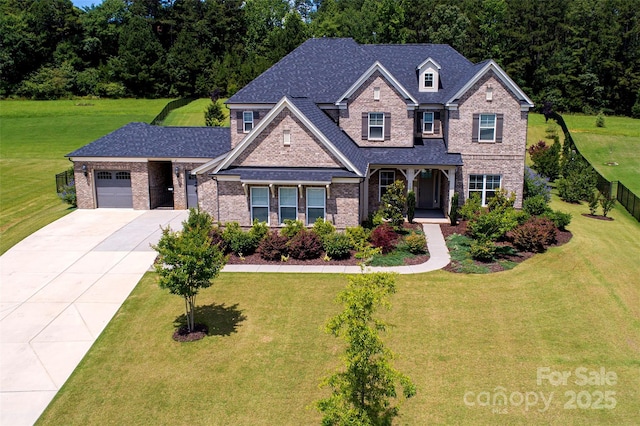 720 Cavesson Way, Monroe, NC 28110 - view of front of house with concrete driveway, brick siding, a garage, roof with shingles, and a porch
