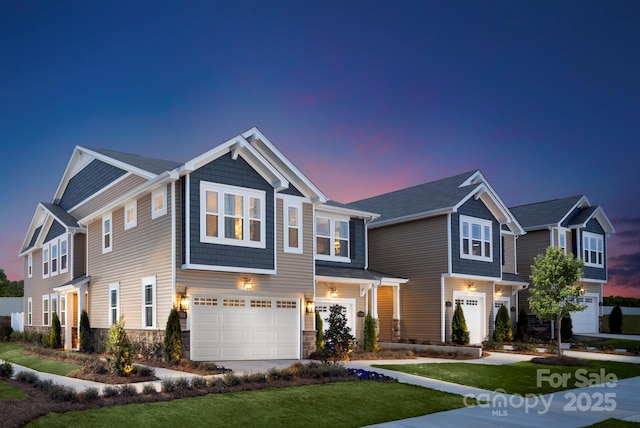 6423 Mallow Crossing Ln, Charlotte, NC 28213 - view of front of property with a garage, driveway, and a front lawn