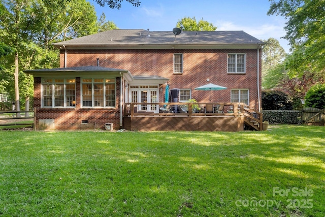4389 Enchantment Cove Ln, Charlotte, NC 28216 - rear view of house with a deck, brick siding, and crawl space