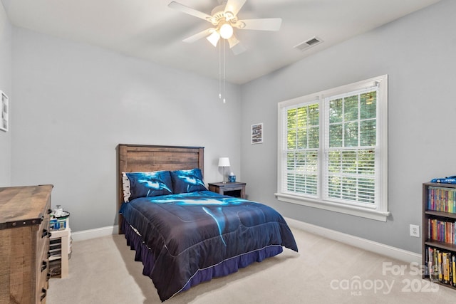 4389 Enchantment Cove Ln, Charlotte, NC 28216 - bedroom with baseboards, carpet, and a ceiling fan