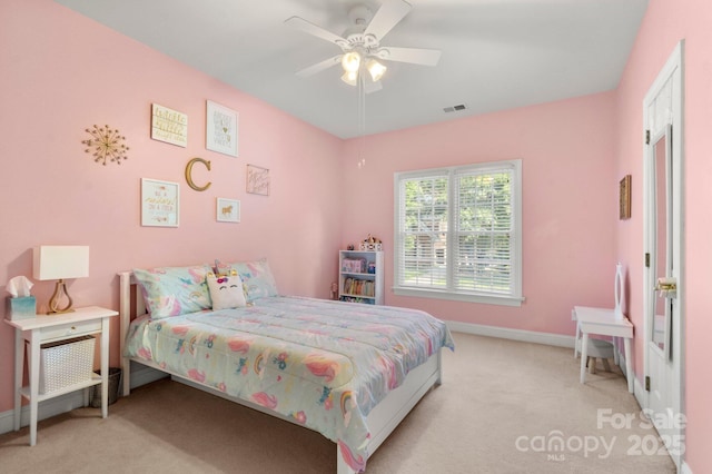 4389 Enchantment Cove Ln, Charlotte, NC 28216 - carpeted bedroom featuring baseboards and ceiling fan