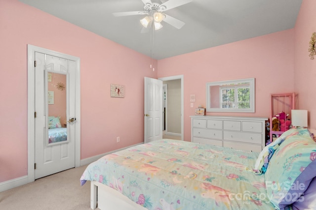 4389 Enchantment Cove Ln, Charlotte, NC 28216 - bedroom with light colored carpet, baseboards, and ceiling fan