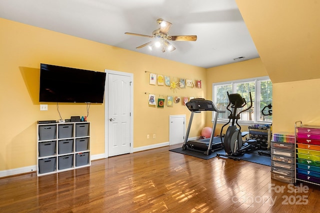 4389 Enchantment Cove Ln, Charlotte, NC 28216 - exercise room with wood finished floors, ceiling fan, and baseboards