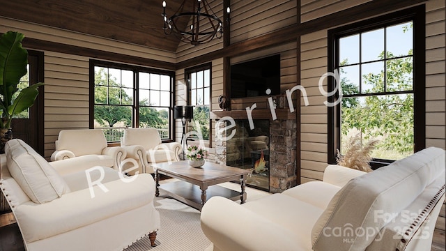 88 Lost Trl Unit 143, Highlands, NC 28741 - living room with a fireplace, a chandelier, and a high ceiling