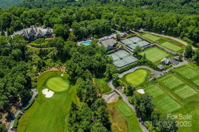 88 Lost Trl Unit 143, Highlands, NC 28741 - view of property location with a heavily wooded area and a golf club