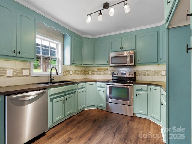 730 Cove Rd, Gastonia, NC 28052 - kitchen featuring appliances with stainless steel finishes, green cabinetry, and a sink