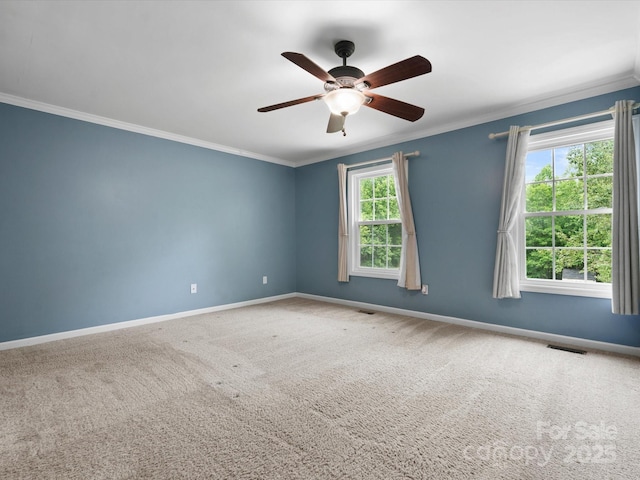 730 Cove Rd, Gastonia, NC 28052 - spare room with crown molding, baseboards, carpet floors, and a ceiling fan