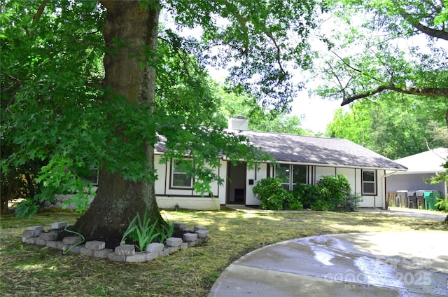 2000 Tyvola Rd, Charlotte, NC 28210 - view of front of house with a chimney