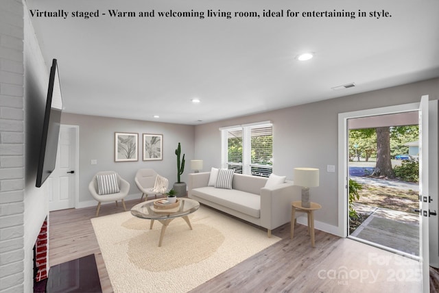 2000 Tyvola Rd, Charlotte, NC 28210 - living room featuring wood finished floors and recessed lighting