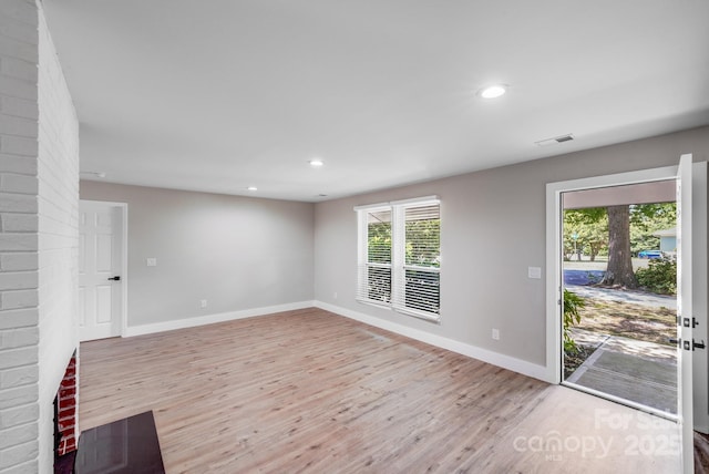2000 Tyvola Rd, Charlotte, NC 28210 - unfurnished room with light wood-style flooring and recessed lighting