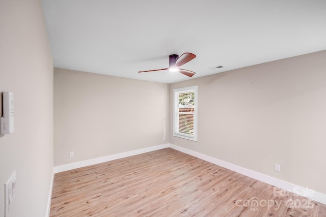 2000 Tyvola Rd, Charlotte, NC 28210 - empty room featuring wood finished floors and a ceiling fan