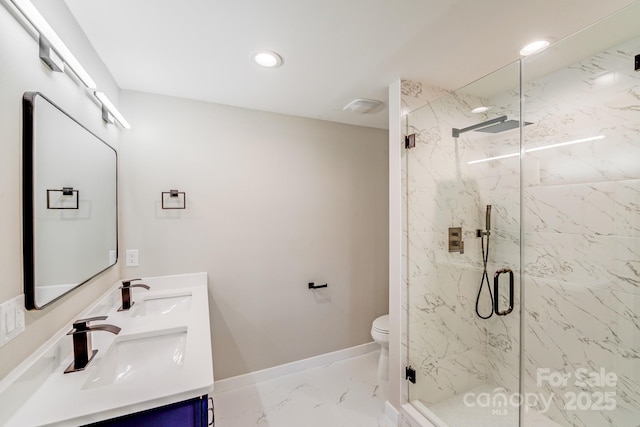 2000 Tyvola Rd, Charlotte, NC 28210 - bathroom with marble look tiles, double vanity, a marble finish shower, and recessed lighting