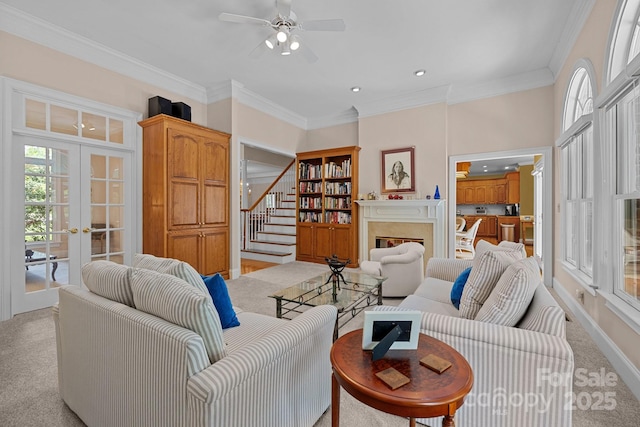 10317 Clubhouse View Ln, Mint Hill, NC 28227 - living room with carpet flooring, french doors, a fireplace, a ceiling fan, and crown molding