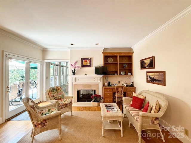 10317 Clubhouse View Ln, Mint Hill, NC 28227 - living room featuring light wood-style floors, crown molding, and a glass covered fireplace