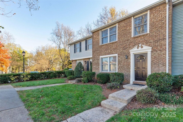9464 Lexington Cir Unit B, Charlotte, NC 28213 - townhome / multi-family property featuring brick siding and a front yard