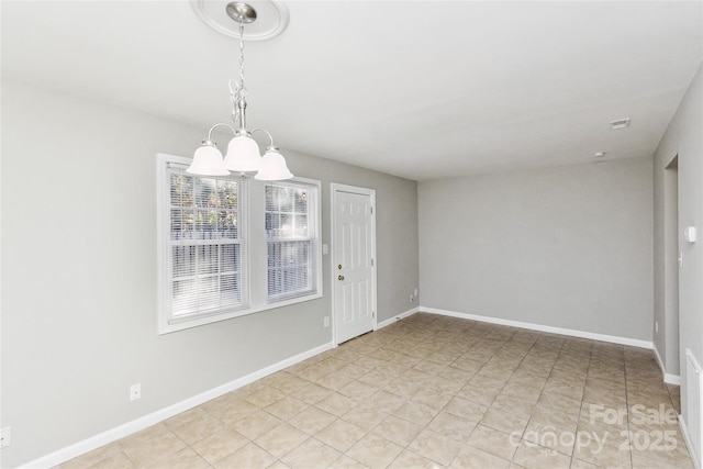 9464 Lexington Cir Unit B, Charlotte, NC 28213 - unfurnished dining area with a chandelier and baseboards