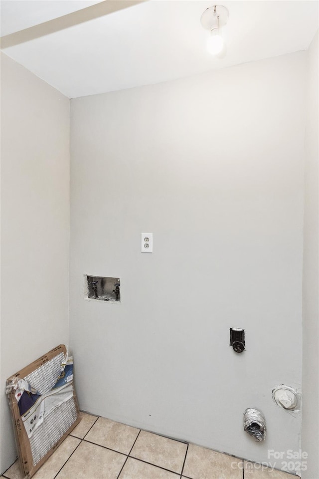 9464 Lexington Cir Unit B, Charlotte, NC 28213 - laundry room with light tile patterned flooring and washer hookup