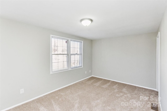 9464 Lexington Cir Unit B, Charlotte, NC 28213 - carpeted empty room featuring baseboards