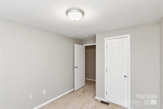 9464 Lexington Cir Unit B, Charlotte, NC 28213 - unfurnished bedroom with carpet floors and baseboards