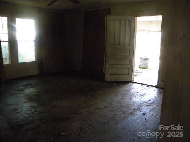 unfurnished room featuring wood-type flooring