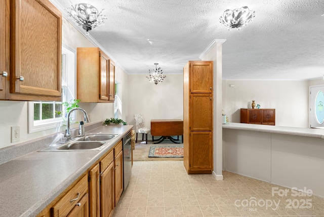 370 Fox Cove Rd, Mars Hill, NC 28754 - kitchen with a sink, light countertops, a textured ceiling, brown cabinetry, and a chandelier