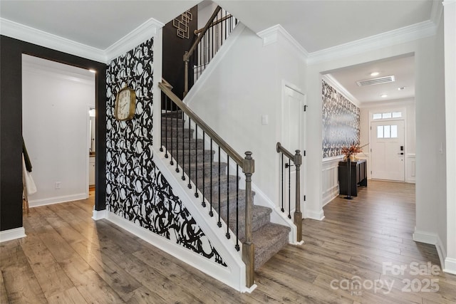5121 Ennisworth Ln, Charlotte, NC 28214 - stairway featuring ornamental molding, wood finished floors, and baseboards