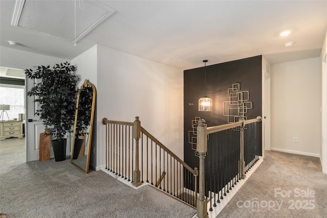 5121 Ennisworth Ln, Charlotte, NC 28214 - corridor with attic access, an upstairs landing, carpet floors, and baseboards