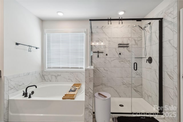 5121 Ennisworth Ln, Charlotte, NC 28214 - bathroom featuring a bath and a shower stall