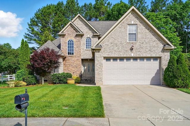 1705 Townsend Ln, Rock Hill, SC 29730 - traditional-style home with a front yard, concrete driveway, brick siding, and a garage