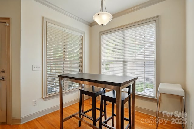 1705 Townsend Ln, Rock Hill, SC 29730 - dining space with ornamental molding, light wood finished floors, and baseboards