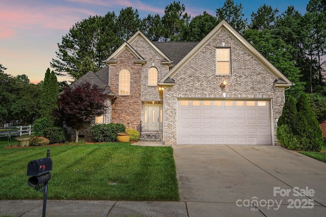 1705 Townsend Ln, Rock Hill, SC 29730 - traditional-style home with driveway, an attached garage, and brick siding