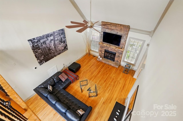 1705 Townsend Ln, Rock Hill, SC 29730 - living area featuring a ceiling fan, a fireplace, wood finished floors, and high vaulted ceiling